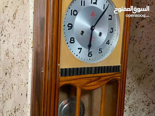 ساعة جدارية قديمة انتيكه