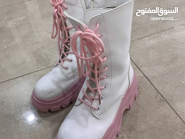 White and pink boots brand new
