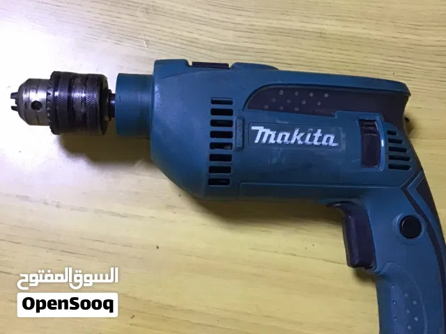 مثقاب مطرقي من طراز ( Makita ) Hp1640