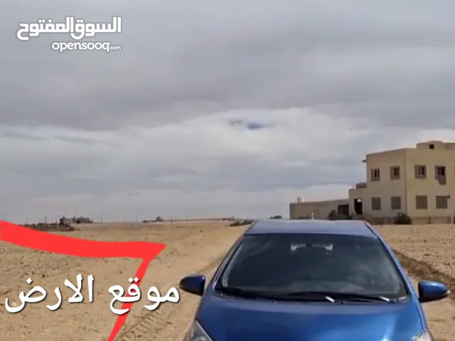 ارض بجانب بير ماء ارتوازي
