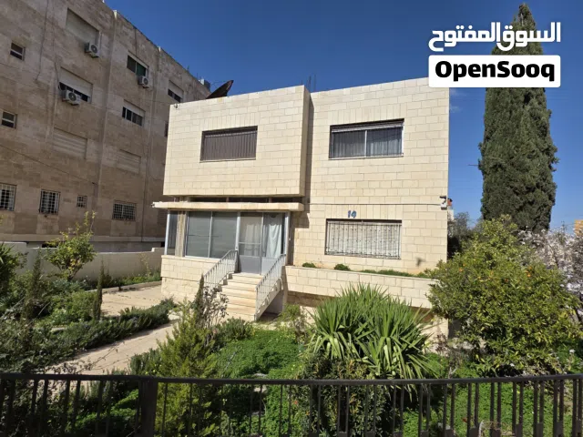 قطعة ارض مع بناء