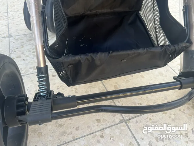 عربة أطفال و مقعد أطفال للسيارة