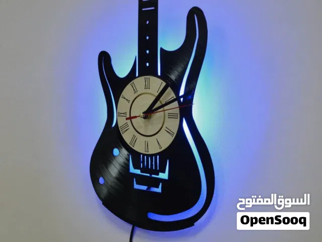 ساعةحائط تصميم جيتارمع ضوءLID
