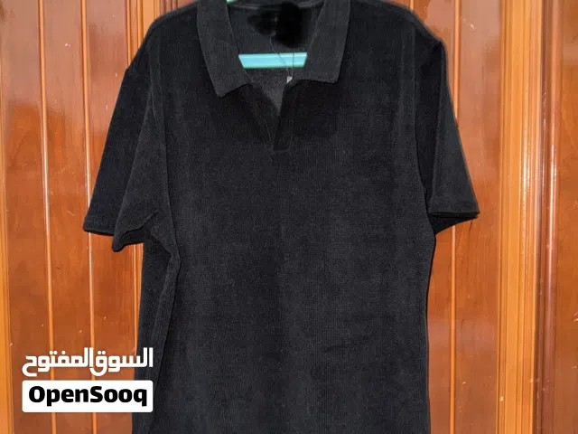 Black polo shirt for sale rlly good quality and size is xs or s