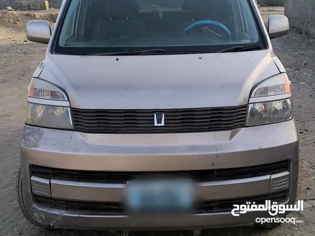باص فوكسي 2004 نظيف لون شكليتي