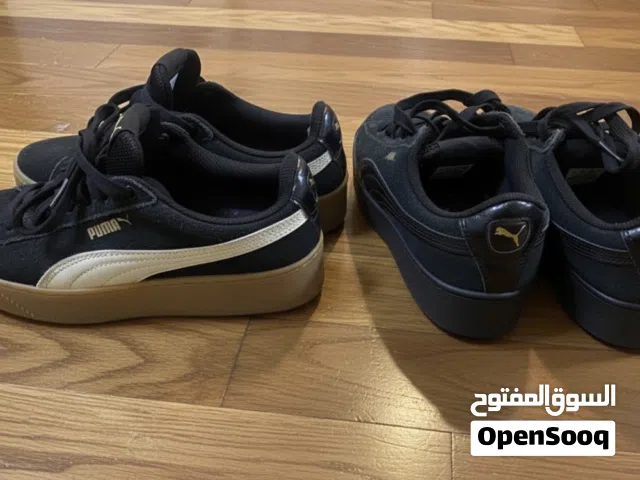 Two puma sneakers