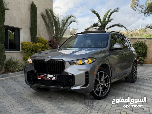 BMW X5 50e ترخيص 2024 محرك 3000 هايبرد plug in/يقطع على الشحنه 100 كيلو متر  510 حصان