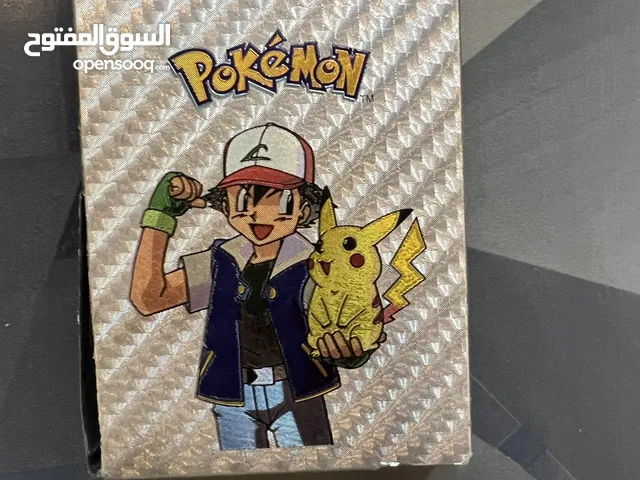 كروت بوكيمون والبومات (Pokemon cards and binders)