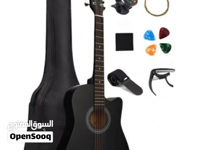 جيتار للبيع بكل مشتملاته ( تونر - قطع للعزف - ماسك أوتار و جراب للجيتار ) مقاس 39