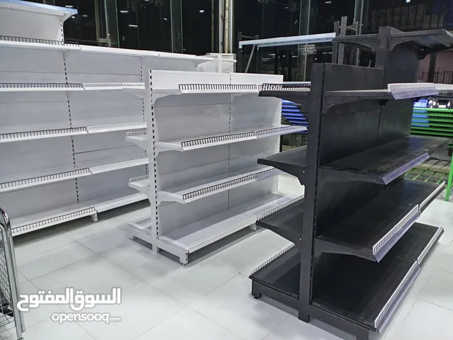 رفوف بقالات رفوف مستودعات رفوف سوبر ماركت رفوف صيدليات طاولات كاشير طبالي عربيات تسريق
