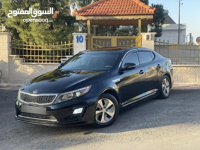 كيا اوبتما 2016 هايبرد وارد امريكي لون اسود بحالة ممتازة فحص كامل ممشى قليل للبيع كاش