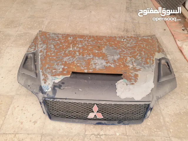 غطاء سيارة معدل أمامي ميتسوبيشي لانسر 2003 محتاج دهان فقط