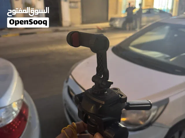 ترايبود كمرا وهاتف