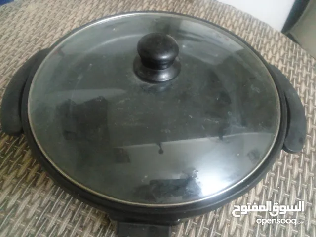 طاوة كهرباىيه