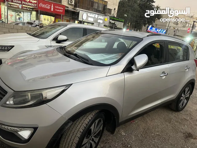 كيا سبورتاج2011 ديزل دفع رباعي ترخيص وتامين سنه فل اضافات بدون فتحه خاليه من الحوادث البيع كاش فقط