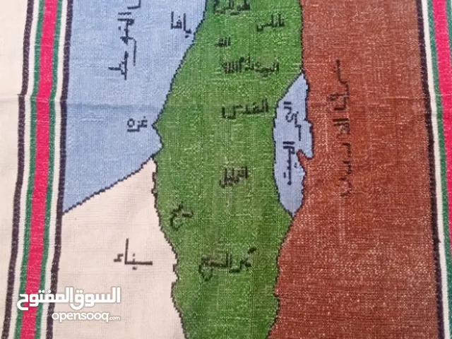 خريطة فلسطين منسوجه بعمل يدوي عمره ا55 سنه