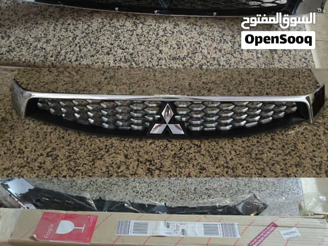 بيع قطة شبك امامي نوع ميتسوبيشي  ايفو لانسر 2014  القطعه جديدة بكرتونها والنوع ياباني مش تايواني