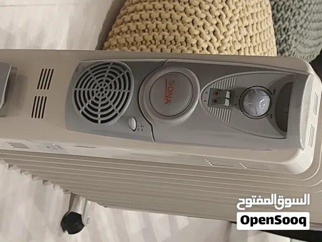 صوبة زيت رديتر اقتصادية عدد 13 شريحة مع مروحة توزيع للهواء الساخن بحالة ممتازة  الجندويل