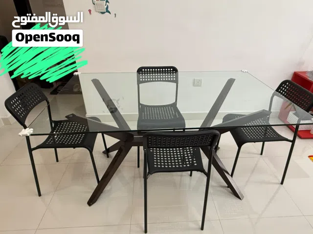 Glass Dining Table with 4 IKEA Chairs urgent sell طاولة طعام زجاجية