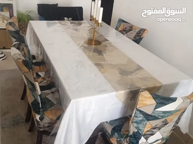 طاولة طعام مع 6 كراسي
