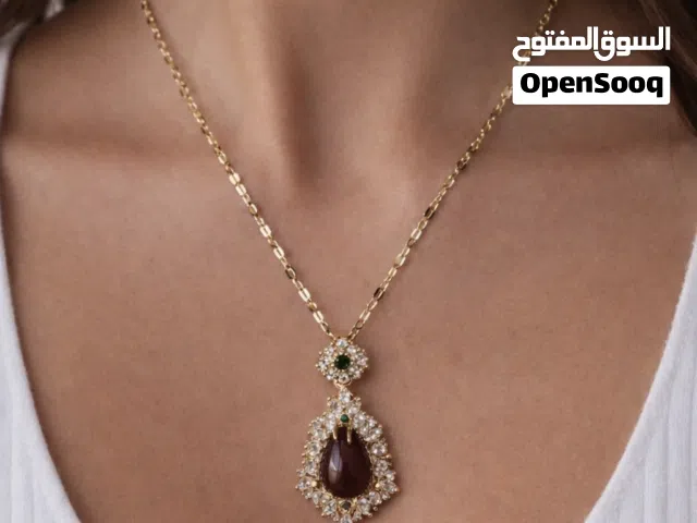 عقدين مطليات مع فص زركون