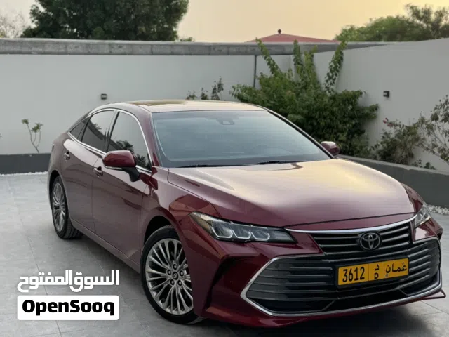 تويوتا افلون خليجي SE+ عنابي وداخل جلد بيج فل مواصفات بحالة الوكالة