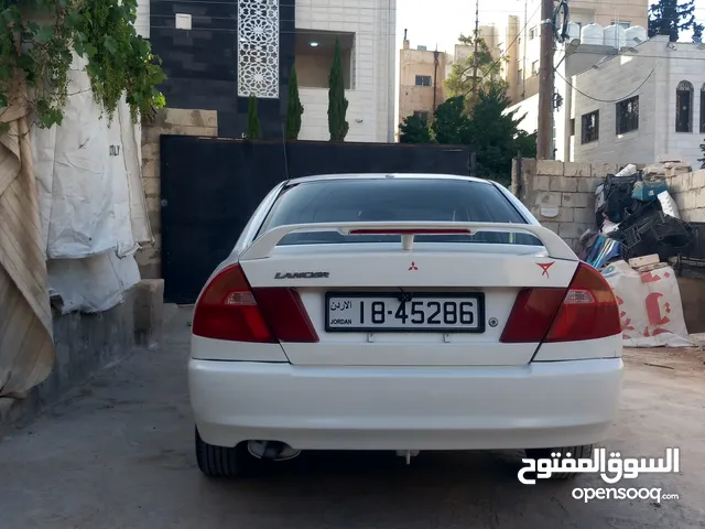 ميتسوبيشي لانسر موديل 1996 ترخيص سنه كامله دهين نظيف السعر 2800قابل للتفاوض