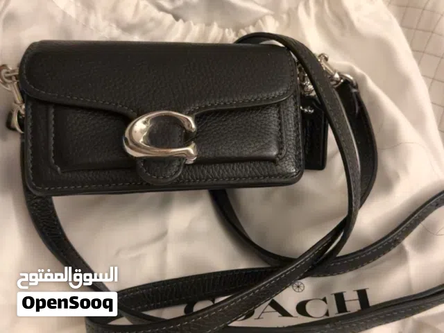 شنطه كوتش لونها اسود اصليه مستعمله