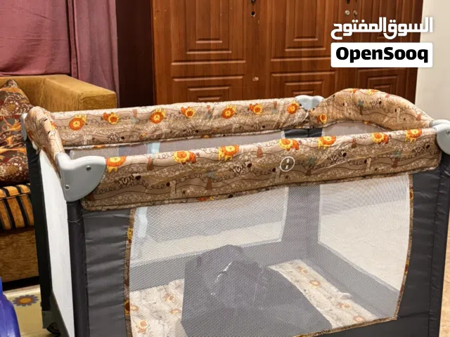 Portable and foldable baby playpen/ travel cot with diaper changing table