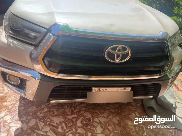 البيع في امدرمان هايلوكس 2021 سعودي اصلي بصمه جوا وبرا قير اتوماتيك ممشى 18 الف عربيه كرتونه اخت