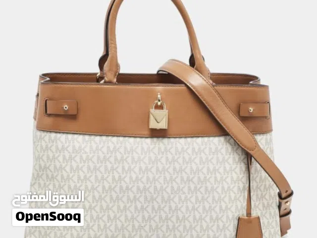 Michael Kors Beige/Tan Signature Coated Canvas and Leather Gramercy. Tote