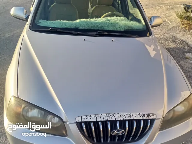 هونداي ألنترا 2006 للبيع ترخيص وتأمين سنة نظيفة من جميع النواحي لون فضي ( دهان الشركة )