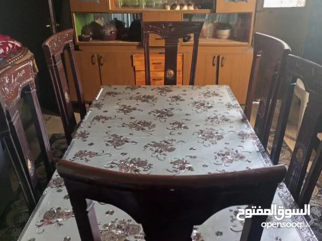 طاولة سفرة كبيرة مع 6 كراسي بحالة جيدة