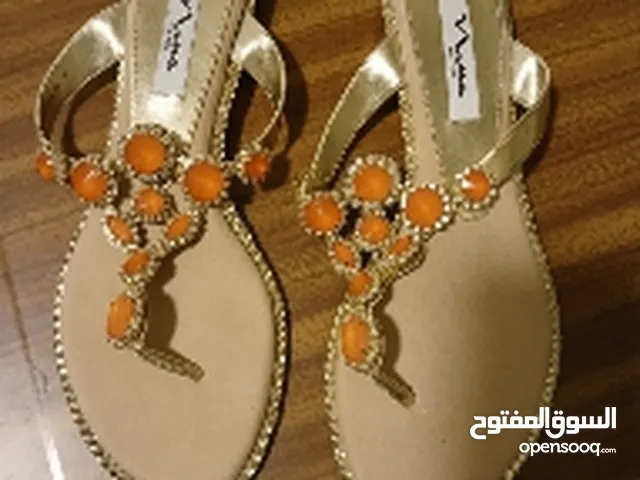 Gold Sandals in Amman