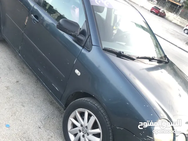 polo 2003 اللون الزيتي