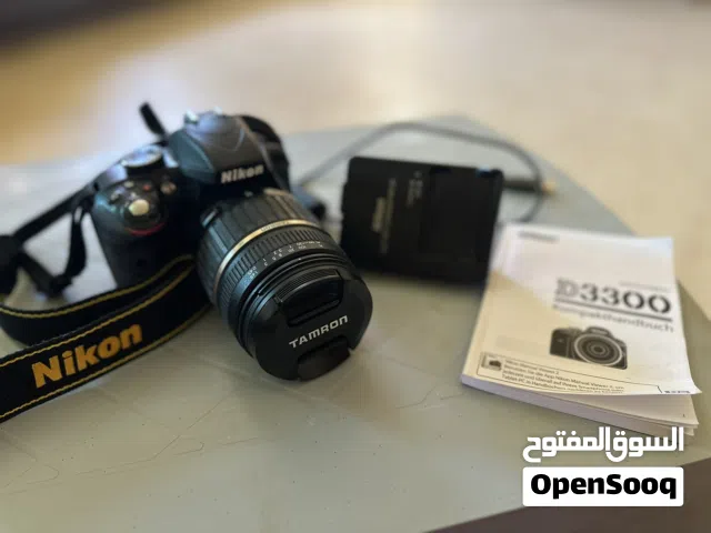 نيكون D3300 بحالة الوكاله مع عدسه TAMRON