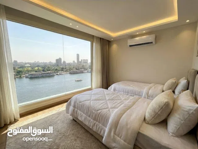 وحدة فندقية عـ النيل والاهرامات متشطبة ومفروشة بأعلي مستوي متأجرالك بعقد موثق شهريآ 110ألف