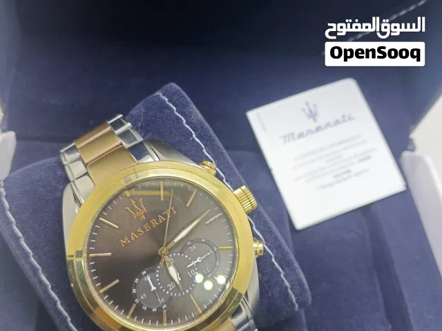 ساعة مازيراتي "تراجواردو" الرجالية (موديل R8873612003) ذات لونين فضي وذهبي. تتميز الساعة بمي