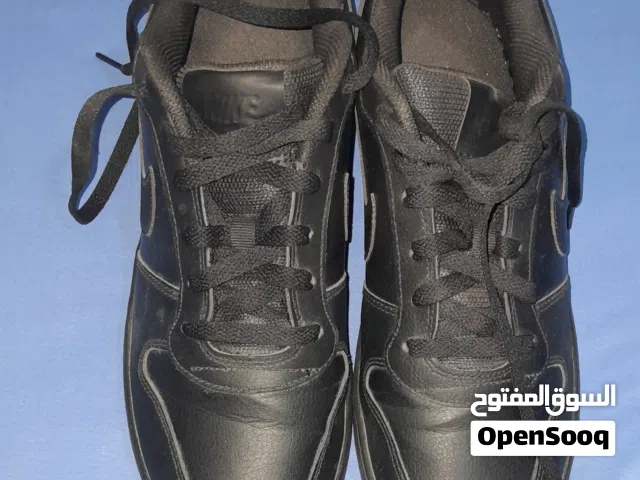 Chaussures Nike A1775‐003 Noires – Très bon état