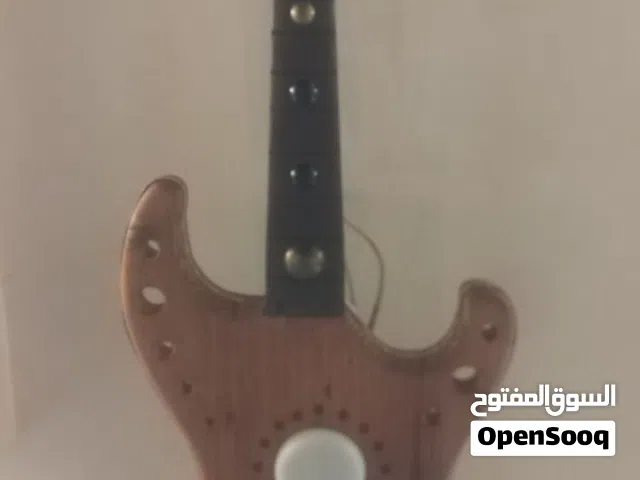 للبيع شكل جيتار تعليق مع اناره خشب سويدي شغل يدوي