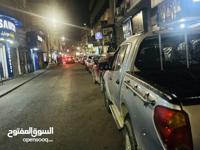 منسوبيشي L200. 215 2جيد خلفي