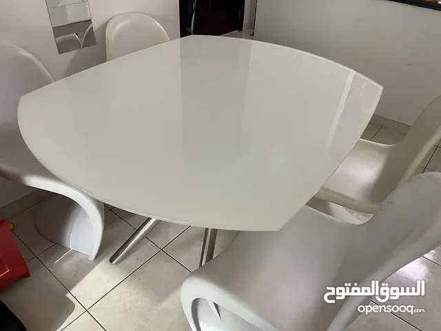 Extendable White Dining Table with 4 Chairs