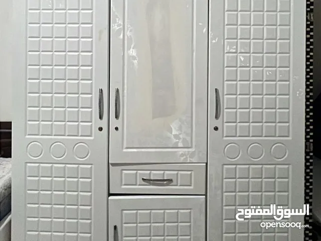 For sale white Wordrobe in perfect condition 4 doors for attractive price only 200 AED