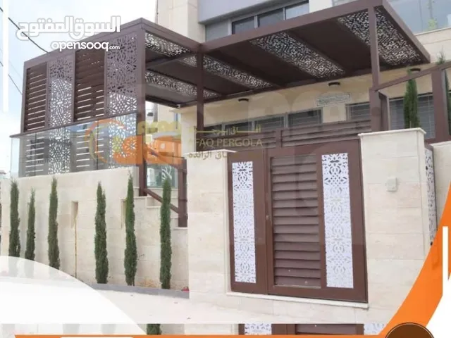 مظلات-دربزينات-أبواب خارجية -ماتورات كهربائية/ ديكورات خارجية/المنيوم خشابي(شركة افاق الرائدة )