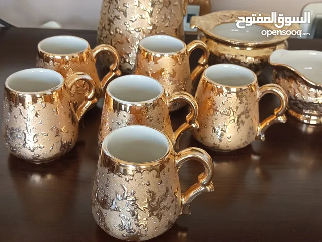 طقمم مطلي 24 قيراط و البورسلان الاصلي