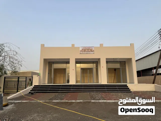 For Rent – Prime Industrial Facility in Barkaللإيجار أرض صناعيه بها محلات في الامام ومظلات في الخلف