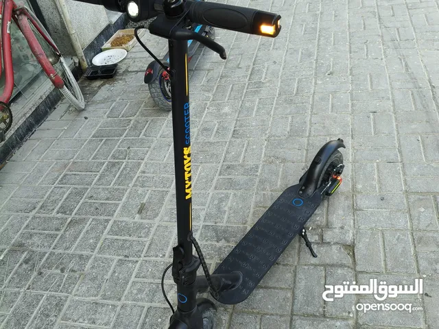 5 days offer mytoys electric scooter with side lights and back and front LED lights .