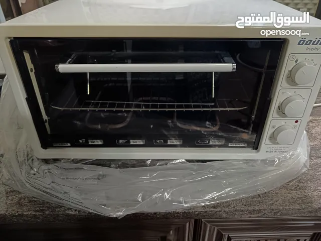 طاولات وسط وفرن كهربا للبيع