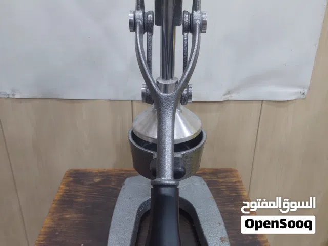 معصارة برتقال يدوية