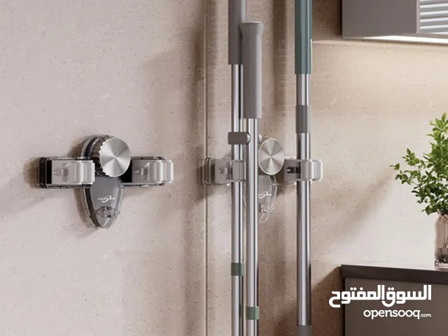 حامل المكانس والمناشف (3 في 1) المطور